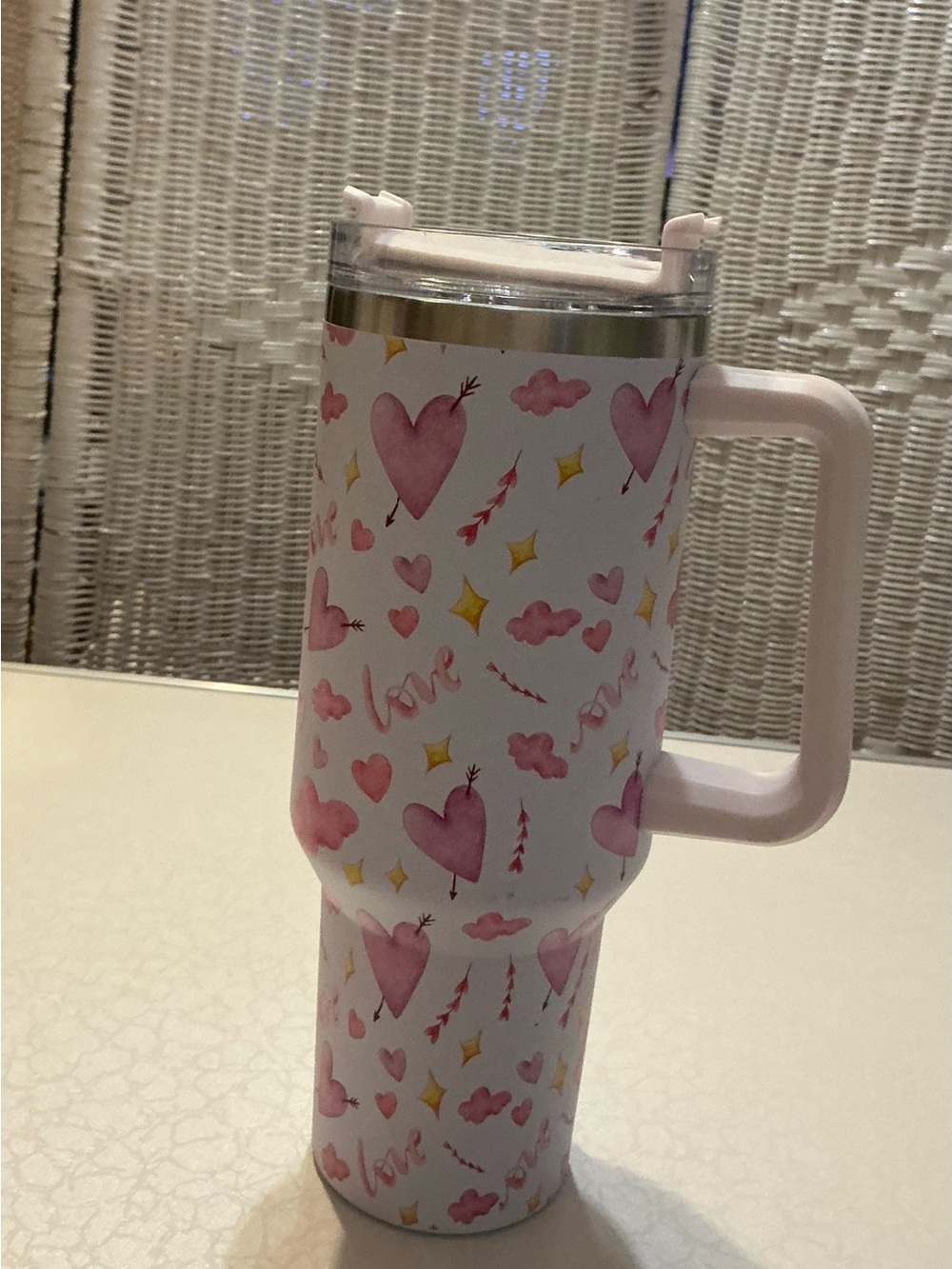 White mug with pink hearts